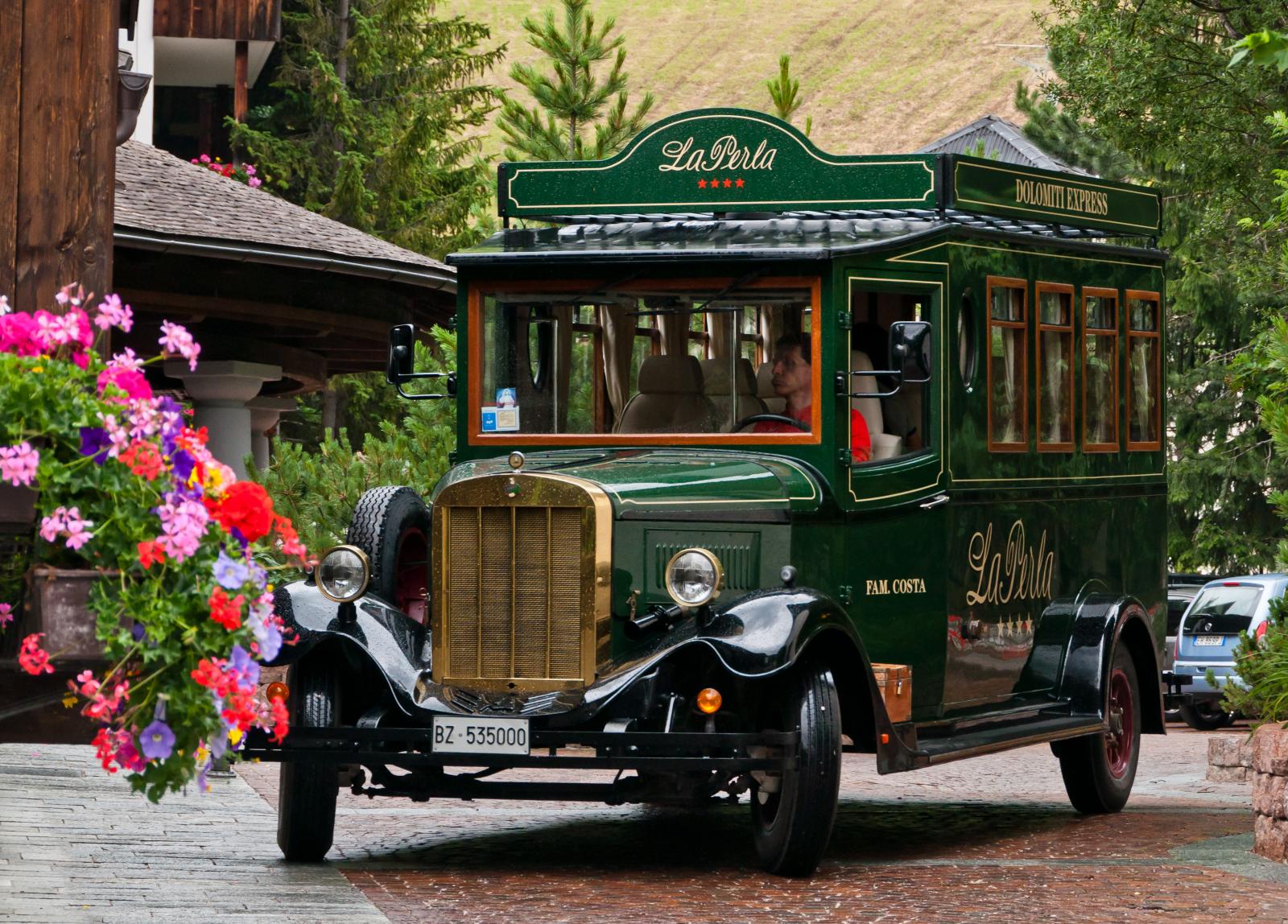 La Perla Dolomiti Express restored bus at Corvara in Badia, Dolomites, Italy.